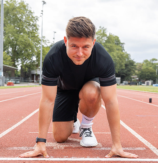 wearing grip socks on running track